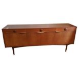 An Elliots of Newbury teak sideboard fitted with t