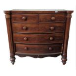 A Victorian mahogany bow front chest of two short