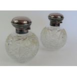 A pair of hob nail cut glass scent bottles with si