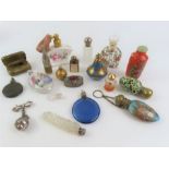 A collection of small decorative scent bottles inc