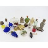 A collection of small scent bottles including deco