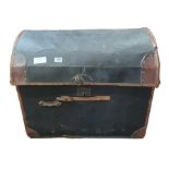 A Victorian domed top travelling trunk, leather bo