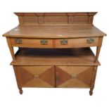 A 20th century oak sideboard with two short drawer