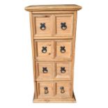 A small, narrow pine chest of four drawers, 81.5cm