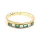 A 9ct gold emerald and diamond half eternity ring,