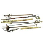 A quantity of assorted bladed weapons including a