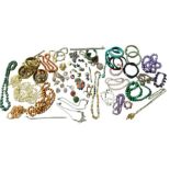 A collection of costume jewellery including bangle