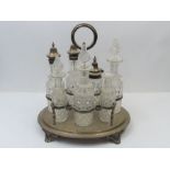 A Victorian seven part silver and cut glass cruet