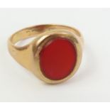 A carnelian set signet ring, hallmarked rubbed, fi