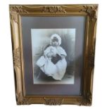 A late Victorian/Edwardian photographic portrait o