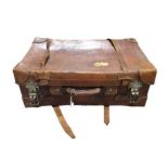 An early 20th Century brown leather suitcase, made