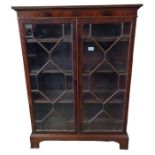 A Georgian style mahogany bookcase the pair of ast