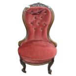 A Victorian button back upholstered mahogany frame
