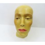 An early 20th Century poured wax display head with