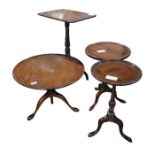 Four assorted mahogany pedestal wine tables (4)