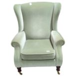 A Georgian style upholstered chair in light green