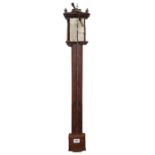 A Georgian stick barometer in mahogany case and ha