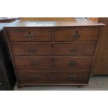 A George III oak chest of two short and three long