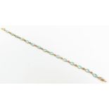 A continental blue topaz spectacle set bracelet, w