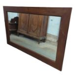 A large rectangular hardwood framed wall mirror ov