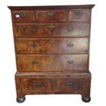 A William and Mary walnut veneered chest of drawer