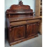 A Victorian mahogany sideboard with raised shelved