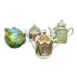Four novelty teapots including Cardew's Globe and