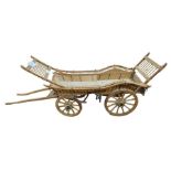 A well constructed wooden model of a farm cart, 85