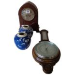An Edwardian mantel clock, two blue and white ging