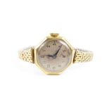 A ladies Avia 9ct gold cased watch face, on a late