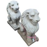 A pair of cast concrete lion garden ornaments, 54c