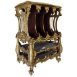A Rococo style gilt wood canterbury, with inset ma