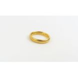 A 22ct gold wedding band, finger size L, 5.7g gros
