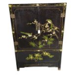 A 20th Century Chinese lacquered cabinet decorated