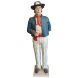 A tall painted figure of a 19th Century matelot, 1