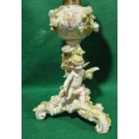 An early 20th Century encrusted porcelain oil lamp
