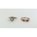 A 9ct gold light blue and white stone cluster ring