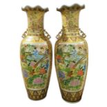 A pair of Japanese floor standing vases, 90cms hig