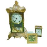 An Ansonia mantel clock with mercury filled pendul