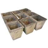 Nine matching stone effect planters with moulded f