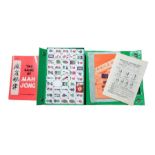 A Mah Jong game in original green carrying case an