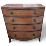 A Victorian mahogany and ebonised bow front chest