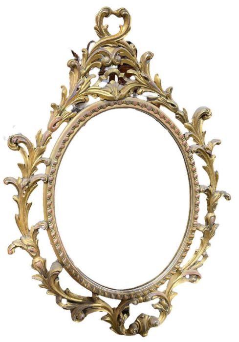 A large decorative gilt wall mirror with scrolling