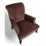 A 19th century armchair, with brown upholstery, 68