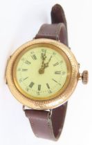 A continental gold cased watch, marked '585', the