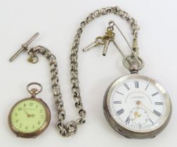 A silver open face pocket watch, the dial signed T
