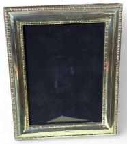 A contemporary Britannia silver photograph frame