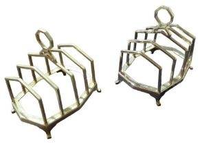 A pair of silver five-division toast racks, by Per