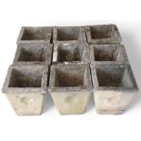Nine matching stone effect planters with moulded f