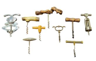 A quantity of assorted corkscrews, some with gnarl